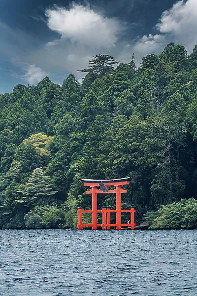 Hakone-jinja shrine standing proud and tall in Ashinoko Lake. Japan