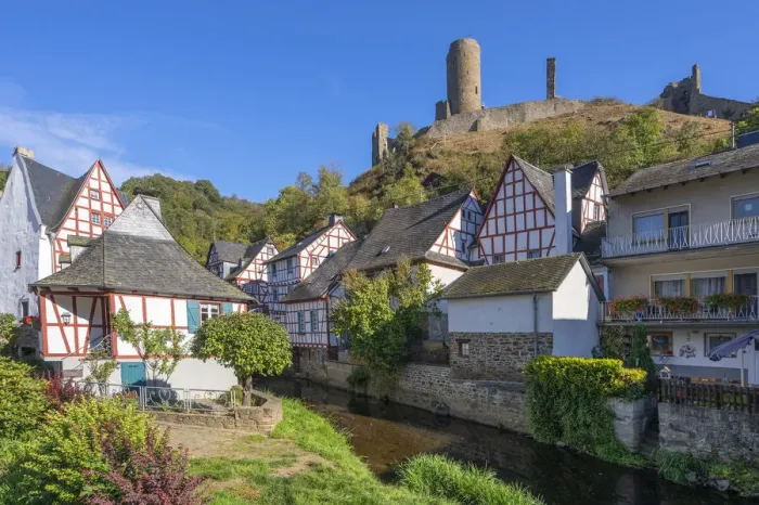 Framed Print : Half-timbered houses at Monreal with Philippsburg castle ruin, Eifel Framed Print : Half-timbered houses at Monreal with Philippsburg castle ruin, Eifel