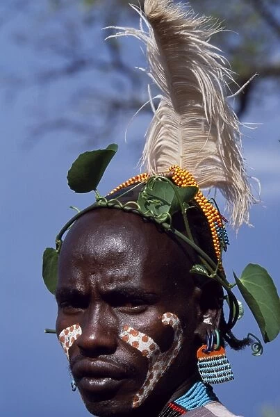 Hamar men paint themselves with white chalk and ochre