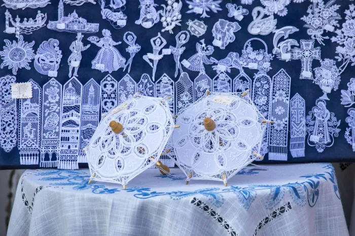Framed Print : Hand made lace goods on sale in a boutique on Burano, Venice, Italy Framed Print : Hand made lace goods on sale in a boutique on Burano, Venice, Italy