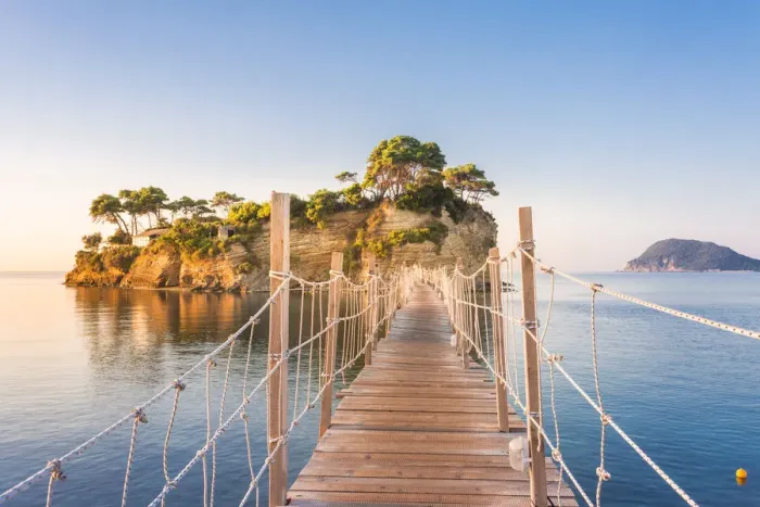 Framed Print : Hanging wooden bridge over the sea leading to Cameo Island, Agios Sostis, Zakynthos Framed Print : Hanging wooden bridge over the sea leading to Cameo Island, Agios Sostis, Zakynthos