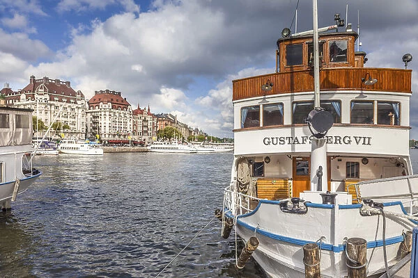 Harbor with historic ferry ships in Strandvagen, Stockholm, Sweden