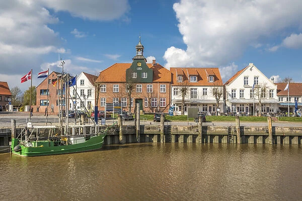 Harbor house and historic houses at the harbor of Toenning, North Friesland
