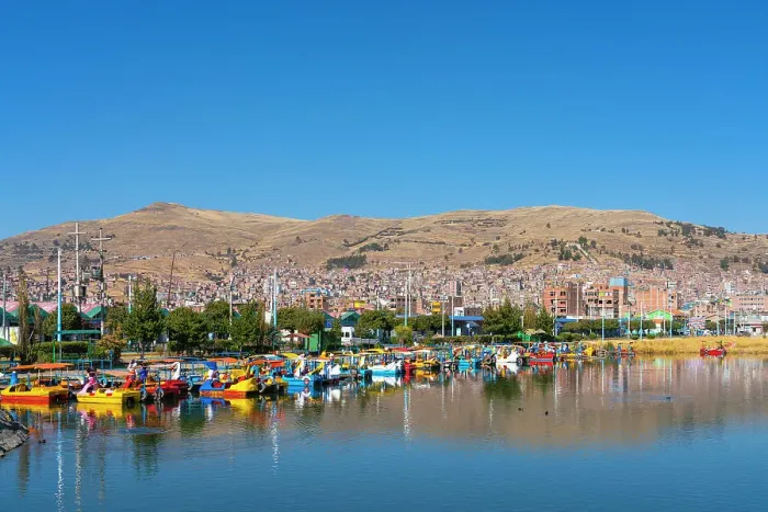 Framed Print : Harbor with tourist paddle boats at Lake Titicaca, Puno, Puno Province, Puno Region, Peru Framed Print : Harbor with tourist paddle boats at Lake Titicaca, Puno, Puno Province, Puno Region, Peru