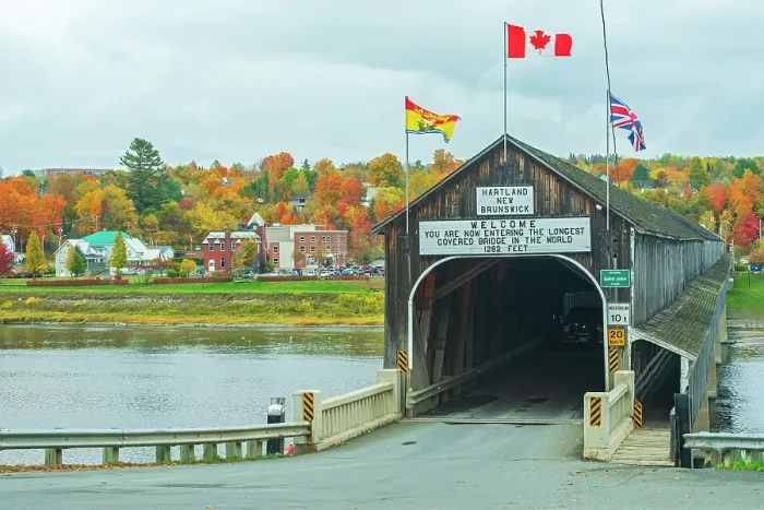 Framed Print : Hartland Covered Bridge is the World's longest covered bridge and crosses the Saint John River Hartland, New Brunswick, Canada Framed Print : Hartland Covered Bridge is the World's longest covered bridge and crosses the Saint John River Hartland, New Brunswick, Canada