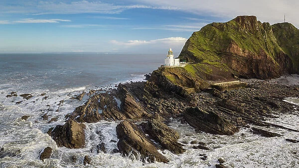 Hartland Point Lighthouse on the dramatic north coast of Devon, England. Winter (December) 2020