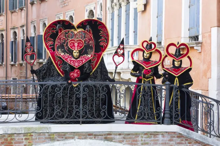 Framed Print : Heart-shaped costumes posing on a bridge at the Venice Carnival, Venice, Italy Framed Print : Heart-shaped costumes posing on a bridge at the Venice Carnival, Venice, Italy