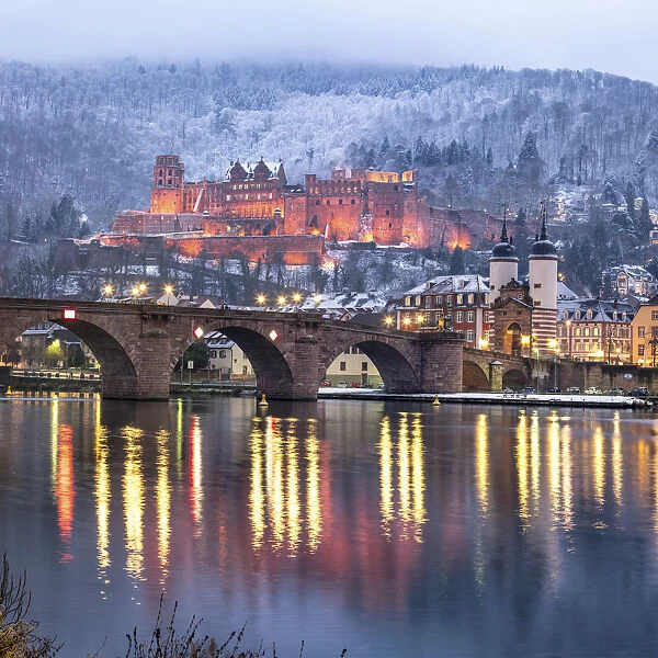 Heidelberg castle and Old Bridge illuminated in winter, Baden-Wurttemberg, Germany