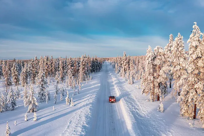 Framed Print : High angle car driving on an icy road among trees covered with snow, Kangos, Lapland, Sweden Framed Print : High angle car driving on an icy road among trees covered with snow, Kangos, Lapland, Sweden