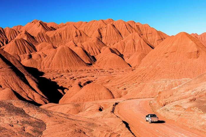 Framed Print : High angle view of a 4x4 driving in the Labyrinth Desert, Puna, Argentina Framed Print : High angle view of a 4x4 driving in the Labyrinth Desert, Puna, Argentina