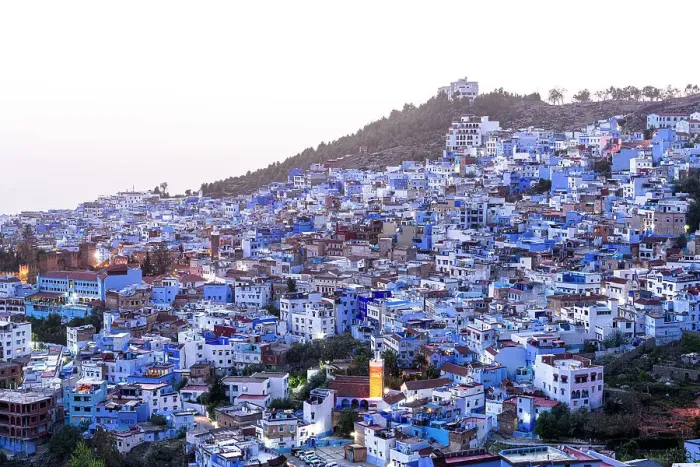 Framed Print : High angle view of the fairy tale blue city of Chefchaouen at dusk, Morocco Framed Print : High angle view of the fairy tale blue city of Chefchaouen at dusk, Morocco