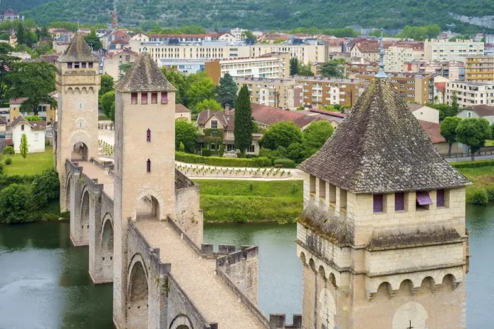 Framed Print : High angle view of medieval Pont Valentre bridge over the Lot River and town