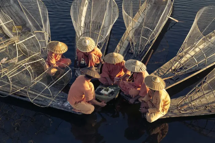 Framed Print : High angle view of traditional fishermen on Lake Inle having a supper on boats together Framed Print : High angle view of traditional fishermen on Lake Inle having a supper on boats together