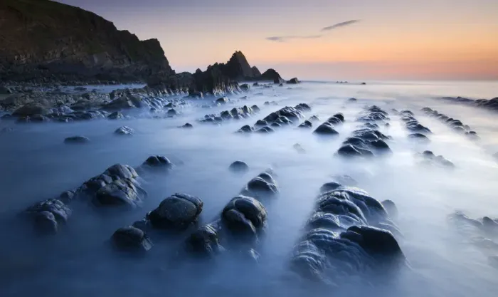 Framed Print : High tide gradually submerges the rocky shores of Blegberry Bay at sunset, Hartland Framed Print : High tide gradually submerges the rocky shores of Blegberry Bay at sunset, Hartland