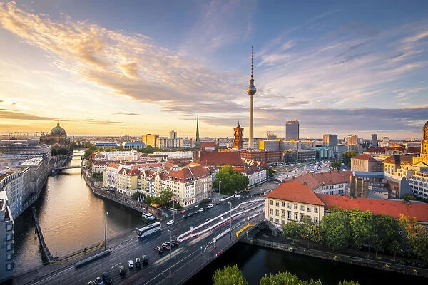 High view of Berlin Mitte district during sunset, with Fernsehturm tower