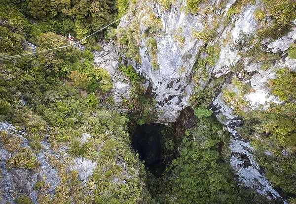 Highlining above Harwoods Hole, Golden Bay, New Zealand, Oceania