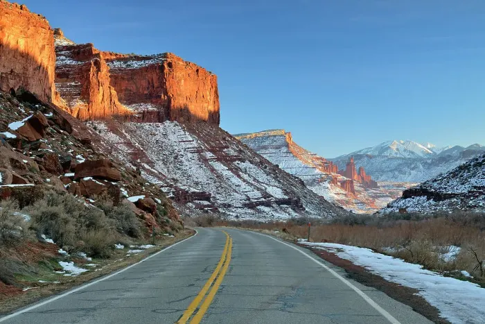 Framed Print : Highway 128 and red rock formations with snow near sunset in winter, Colordao Riverway Recreation Area, Utah, USA Framed Print : Highway 128 and red rock formations with snow near sunset in winter, Colordao Riverway Recreation Area, Utah, USA