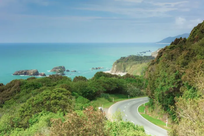 Framed Print : The highway crossing the West Coast in southern New Zealand wit the Tasman sea in Framed Print : The highway crossing the West Coast in southern New Zealand wit the Tasman sea in