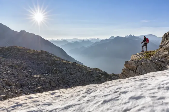 Framed Print : Hiker looking to the valley from the Peterskopfl, Ginzling, Zillertal, Tyrol, Austria