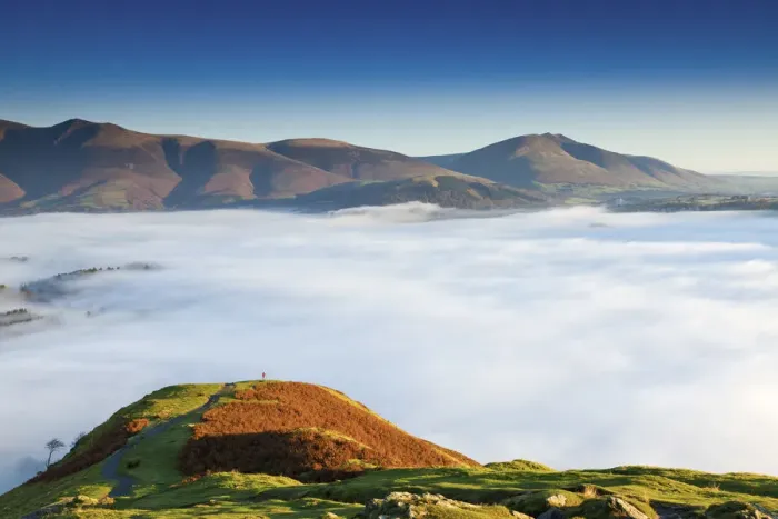 Framed Print : Hiker Overlooking Low Cloud From Catbells, Lake District National Park, Cumbria, England Framed Print : Hiker Overlooking Low Cloud From Catbells, Lake District National Park, Cumbria, England