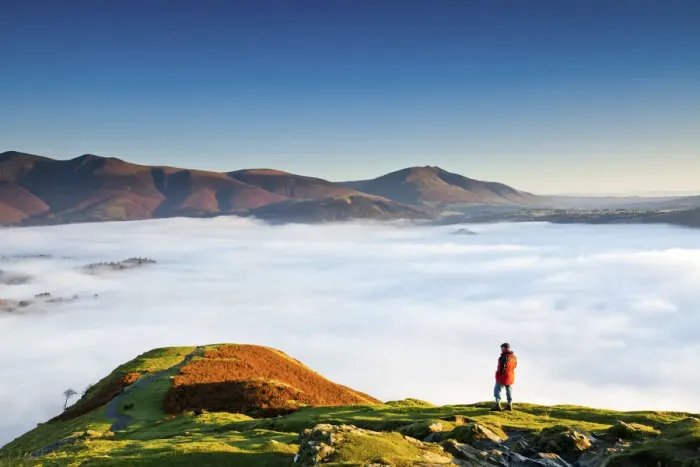 Framed Print : Hiker Overlooking Low Cloud From Catbells, Lake District National Park, Cumbria, England Framed Print : Hiker Overlooking Low Cloud From Catbells, Lake District National Park, Cumbria, England