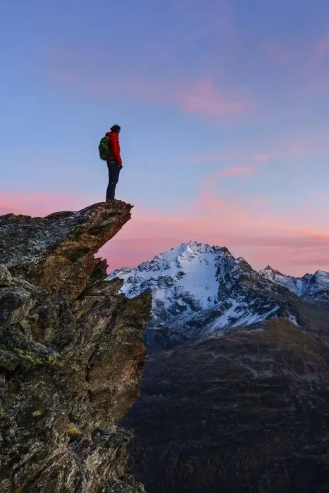 Framed Print : An hiker on a rock with a panoramic view at sunset. Valdidentro, Valtellina, Lombardy Framed Print : An hiker on a rock with a panoramic view at sunset. Valdidentro, Valtellina, Lombardy