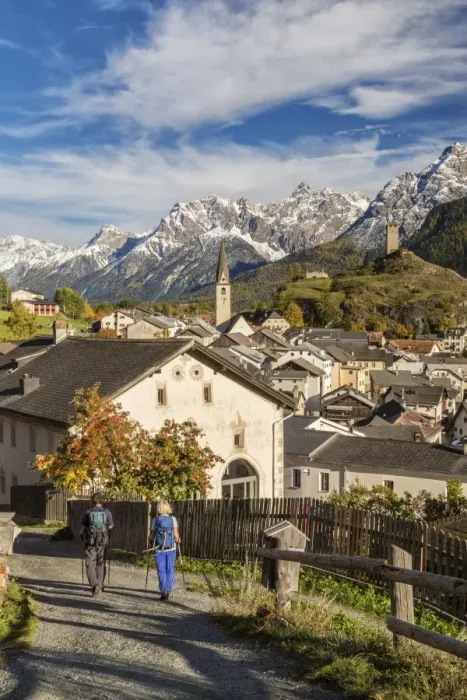 Framed Print : Hikers admire Ardez village surrounded by woods and snowy peaks Lower Engadine Canton Framed Print : Hikers admire Ardez village surrounded by woods and snowy peaks Lower Engadine Canton