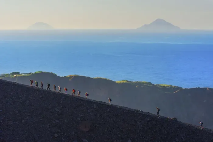 Framed Print : Hikers walking around Gran Crater rim, Vulcano Island, Aeolian Islands, Sicily, Italy Framed Print : Hikers walking around Gran Crater rim, Vulcano Island, Aeolian Islands, Sicily, Italy