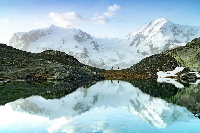Framed Print : Hikers walking on mountain ridge lakeshore with the snowcapped Lyskamm and Breithorn on background, Zermatt, Valais, Switzerland Framed Print : Hikers walking on mountain ridge lakeshore with the snowcapped Lyskamm and Breithorn on background, Zermatt, Valais, Switzerland