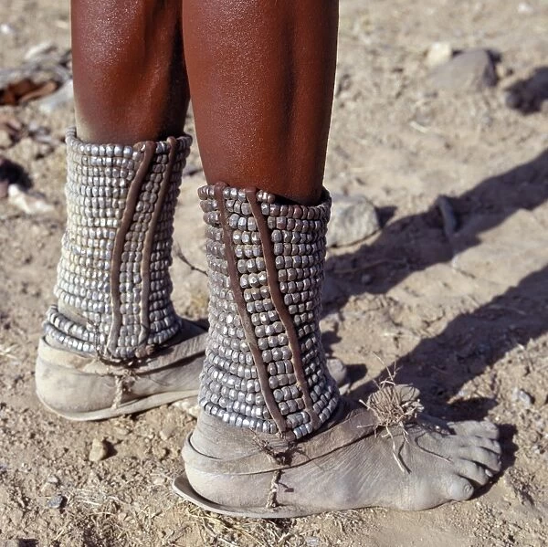 Almost every Himba woman wears anklets