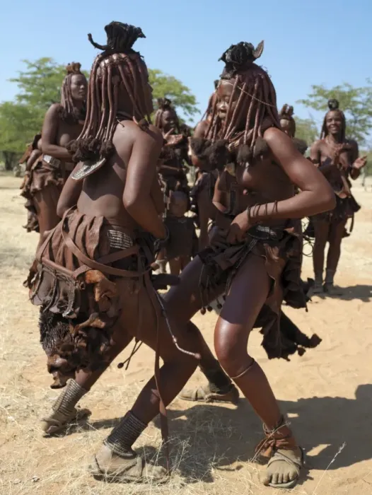 Framed Print : Himba women perform the otjiunda dance Framed Print : Himba women perform the otjiunda dance