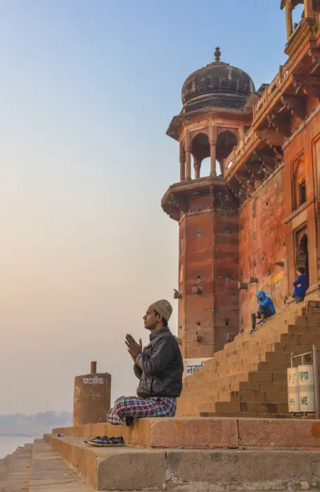 Framed Print : Hinduist practicising meditation, Cityscape from Ganges, Varanasi, Uttar Pradesh, India Framed Print : Hinduist practicising meditation, Cityscape from Ganges, Varanasi, Uttar Pradesh, India