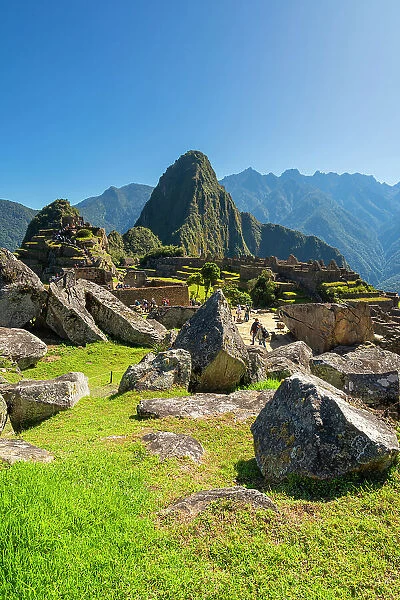 Historic ancient archeological Incan Lost City of Machu Picchu on mountain in Andes, Cuzco Region, Peru