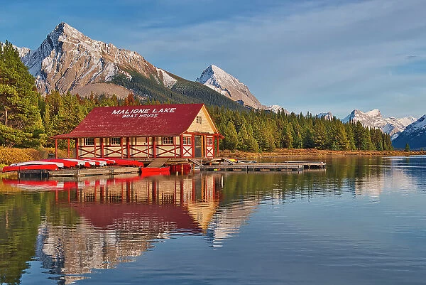 Historic boat house on Maligne Lake and the Queen Elizabeth Ranges, Jasper National Park, Alberta, Canada
