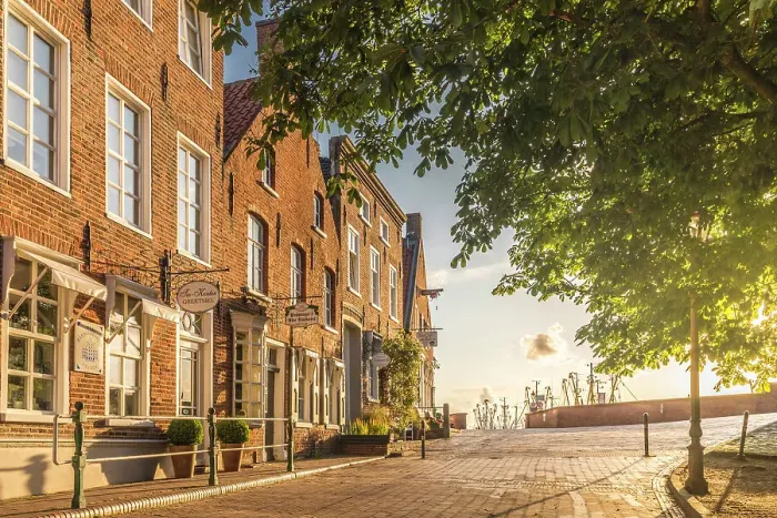 Framed Print : Historic brick houses at the harbor in Greetsiel, East Frisia, Lower Saxony, Germany Framed Print : Historic brick houses at the harbor in Greetsiel, East Frisia, Lower Saxony, Germany