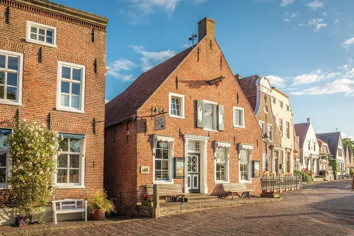 Framed Print : Historic brick houses at the harbor in Greetsiel, East Frisia, Lower Saxony, Germany