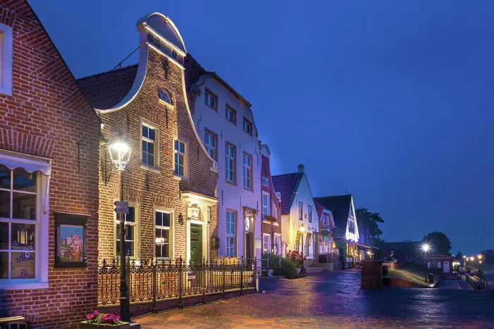 Framed Print : Historic brick houses at the harbor of Greetsiel at blue hour, East Frisia, Lower Saxony, Germany Framed Print : Historic brick houses at the harbor of Greetsiel at blue hour, East Frisia, Lower Saxony, Germany