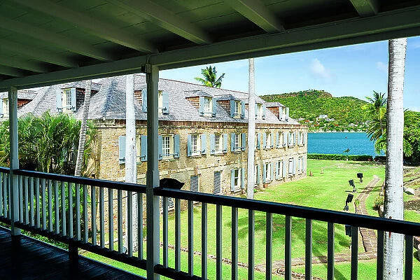 Historic buildings view from a colonial style veranda, Nelson's Dockyard, English Harbour, Antigua, Caribbean, West Indies