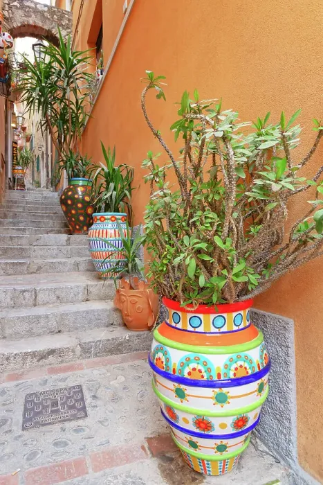 Framed Print : Historic district street filled with artwork, Taormina, Sicily, Italy Framed Print : Historic district street filled with artwork, Taormina, Sicily, Italy