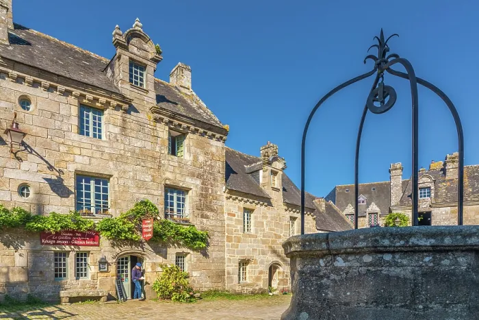 Framed Print : Historic granite stone houses at Place de l'Eglise in Locronan, Finistere, Brittany, France
