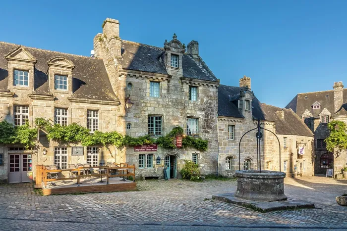 Framed Print : Historic granite stone houses at Place de l'Eglise in Locronan, Finistere, Brittany, France Framed Print : Historic granite stone houses at Place de l'Eglise in Locronan, Finistere, Brittany, France