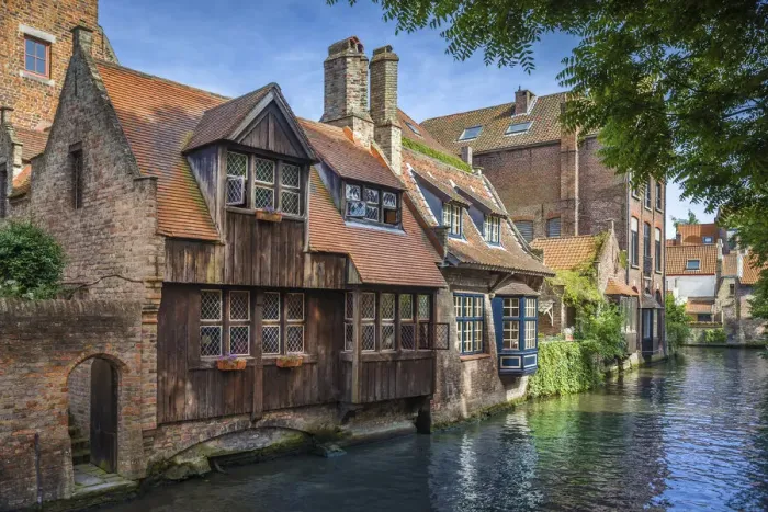 Framed Print : Historic houses and canals in the old town of Bruges, West Flanders, Belgium Framed Print : Historic houses and canals in the old town of Bruges, West Flanders, Belgium