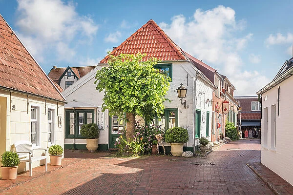Historic houses in the old town of Greetsiel, East Frisia, Lower Saxony, Germany