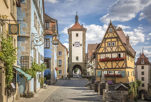 Historic houses and Spitaltor in Untere Schmiedgasse in the old town of Rothenburg ob der