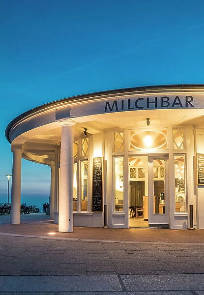 Historic milk bar from 1935 on the western beach of Norderney at blue hour, East Frisian Islands, East Frisia, Lower Saxony, Germany