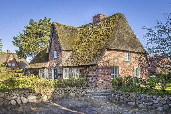 Historic thatched roof house in Tinnum, Sylt, Schleswig-Holstein, Germany