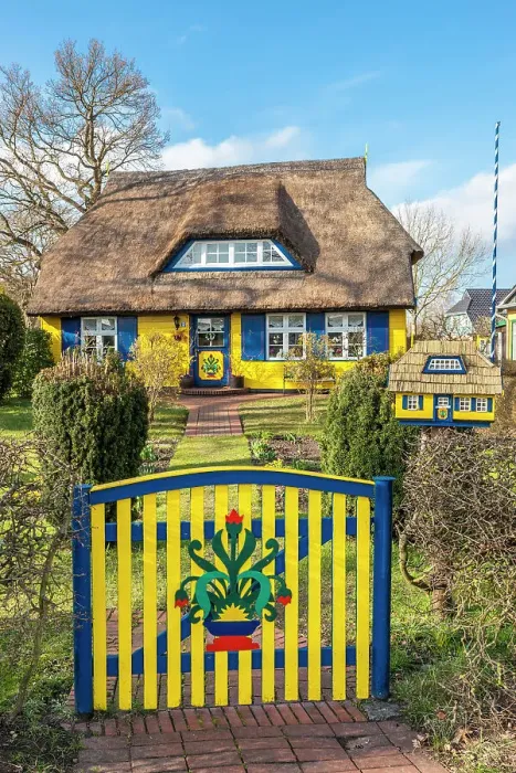 Framed Print : Historical brightly painted thatched roof house in Born am Darsz, Mecklenburg-Western Pomerania, Baltic Sea, Northern Germany, Germany Framed Print : Historical brightly painted thatched roof house in Born am Darsz, Mecklenburg-Western Pomerania, Baltic Sea, Northern Germany, Germany