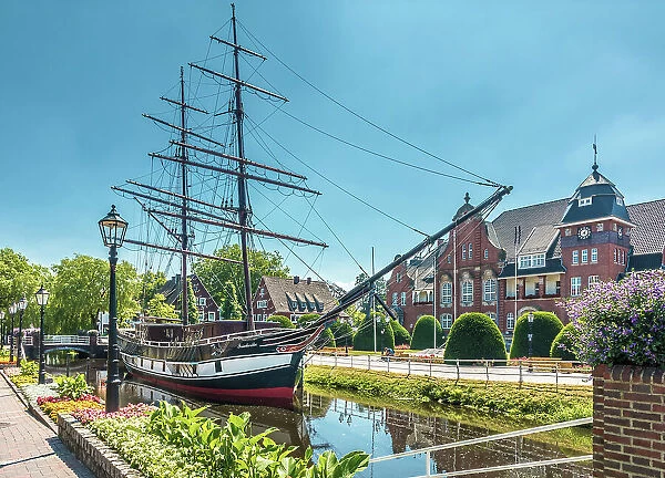 Historical sailor Friederike von Papenburg on the main canal with town hall, Papenburg, Emsland, Lower Saxony, Germany
