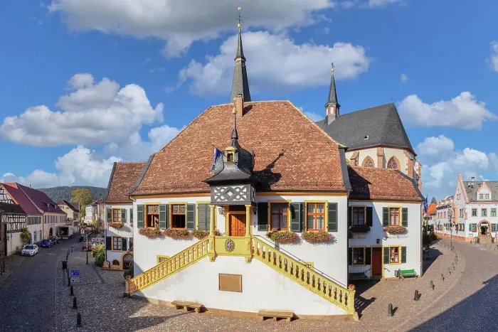 Framed Print : Historical townhall with parish church of St. Ulrich, Deidesheim, German Wine Route, Rhineland-Palantine, Germany Framed Print : Historical townhall with parish church of St. Ulrich, Deidesheim, German Wine Route, Rhineland-Palantine, Germany