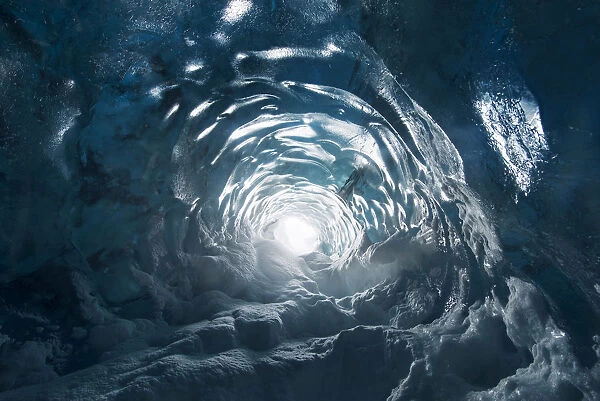 Hole inside an ice cave in the Vatnajokull National Park, Iceland